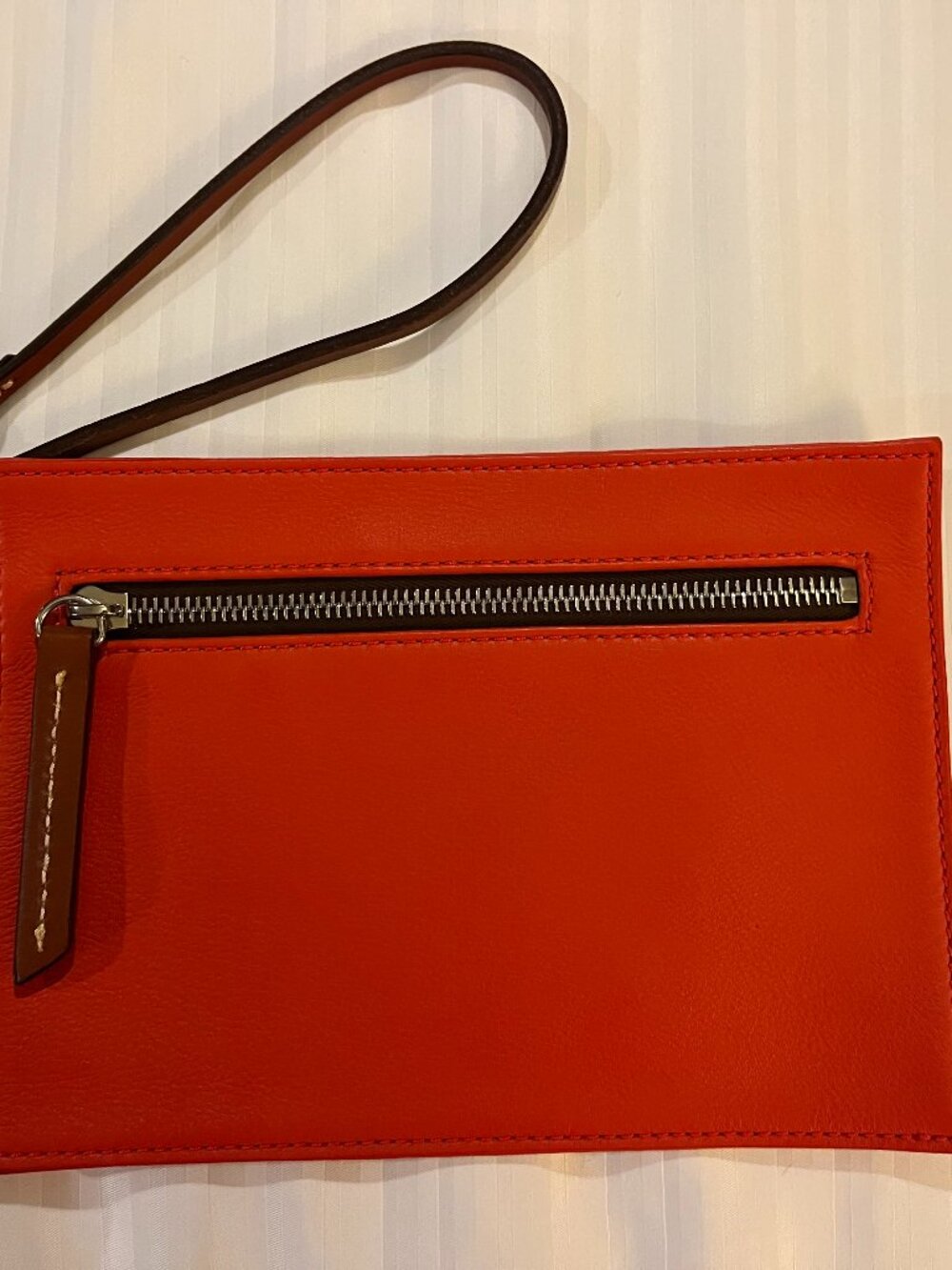 Dooney & Bourke Leather Wristlet NWOT Deep Orange Color British Tan Strap & Trim